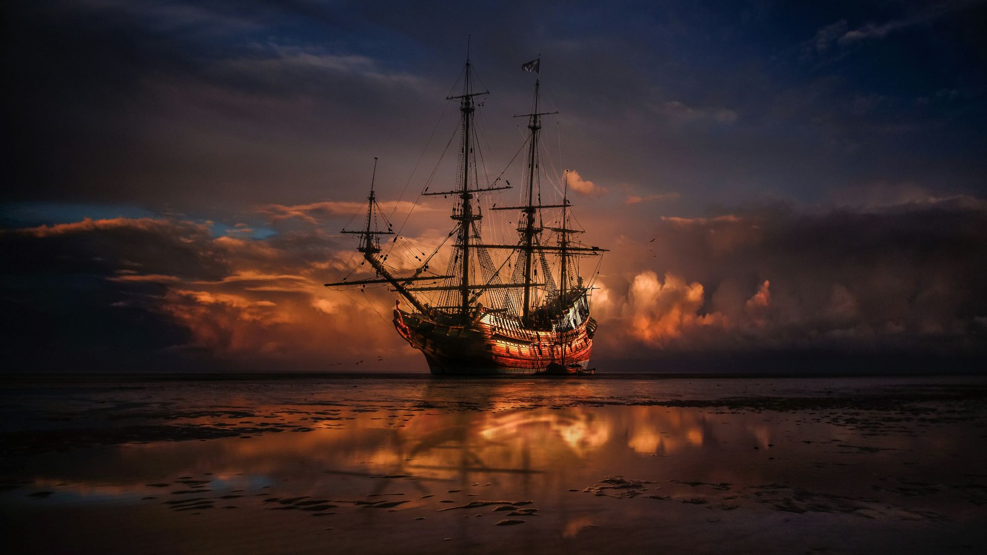 brown ship on sea during sunset
