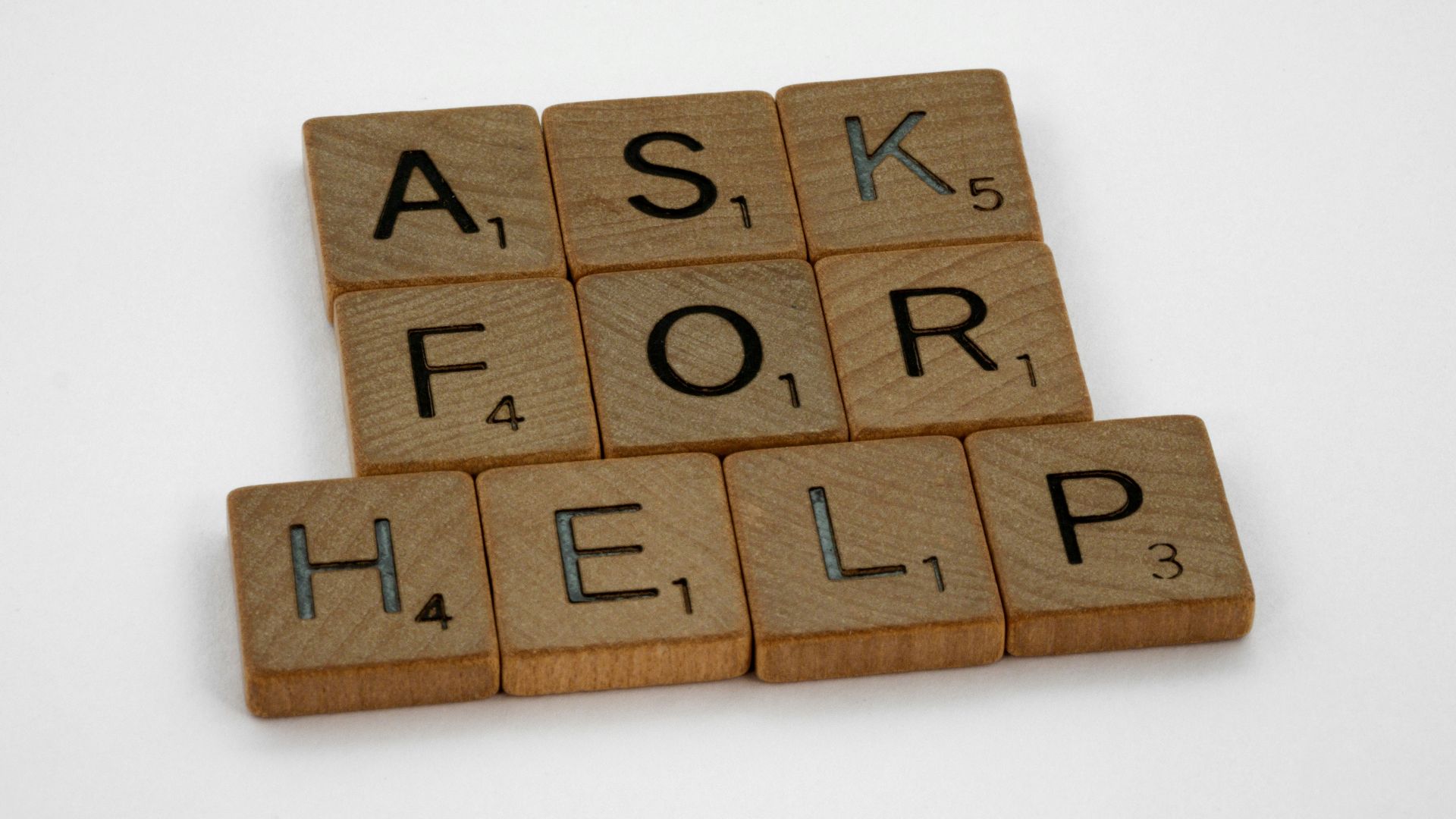 brown wooden blocks on white surface