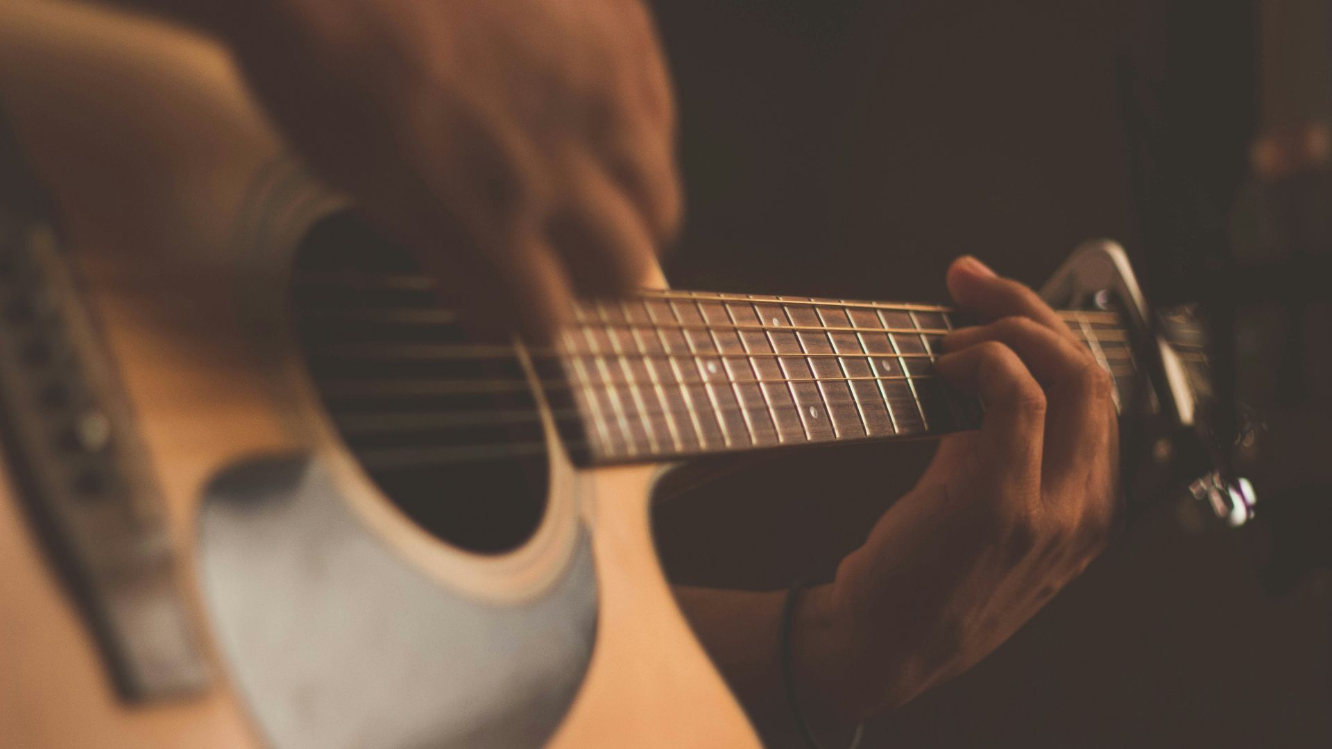 person playing guitar