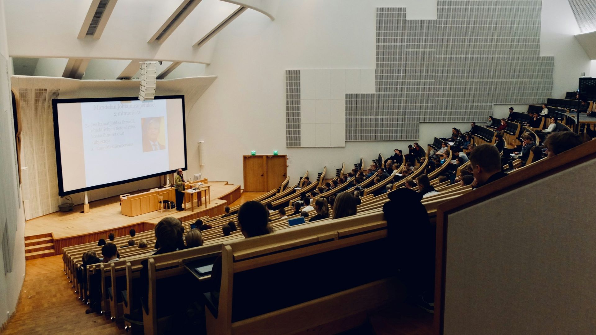 people sitting on chair in front of computer