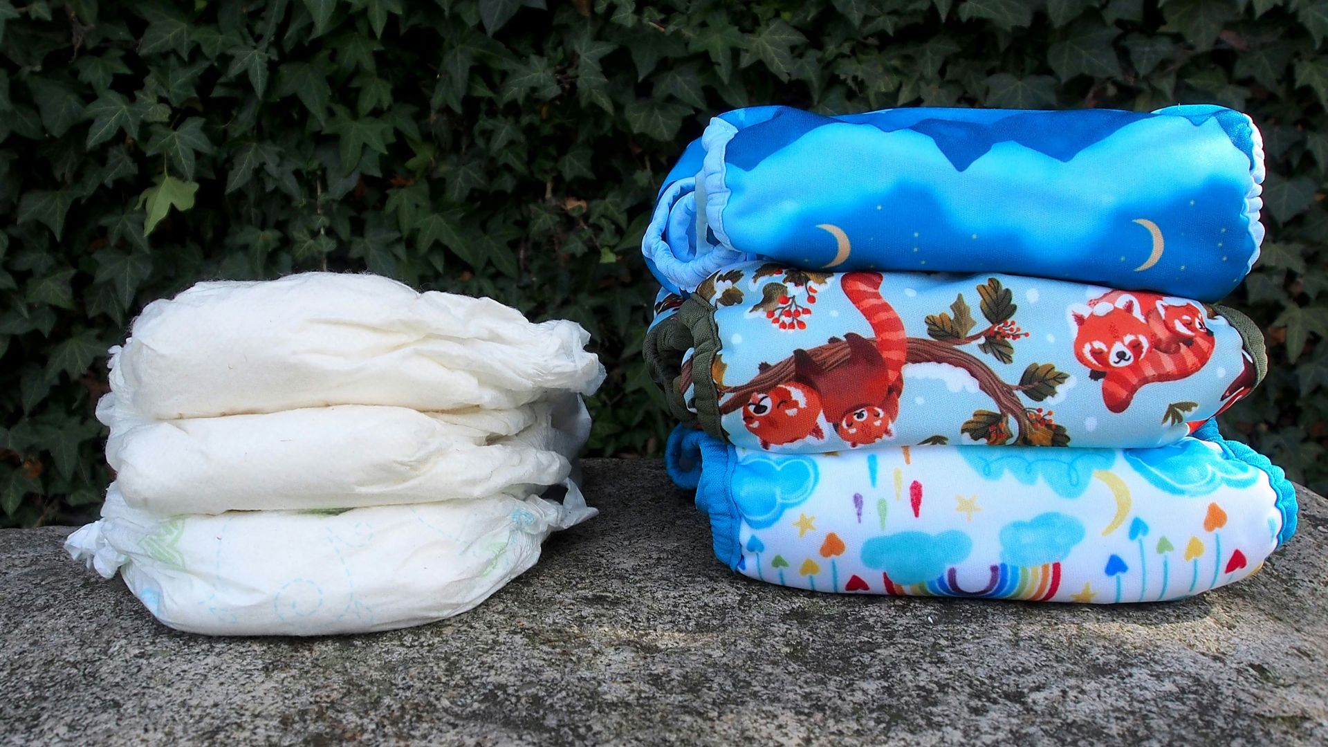a pile of diapers sitting on top of a rock