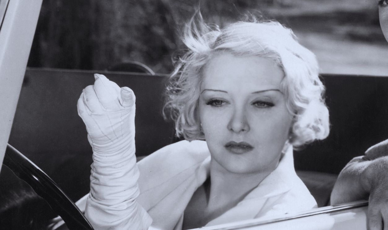 Gettyimages - 128010448, Mary Nolan And Eddie Quillan In 'The Big Shot' Mary Nolan in car while Eddie Quillan leans against car door in a scene from the film 'The Big Shot', 1932. 