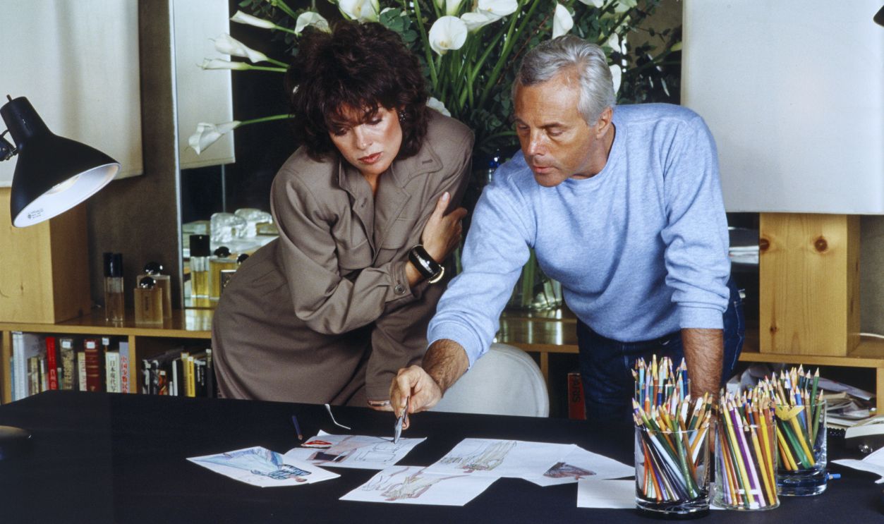 Gettyimages - 461755523, Giorgio Armani and Gray Italian fashion designer Giorgio Armani and Gray looking at sketches of some models. May, 1983. 