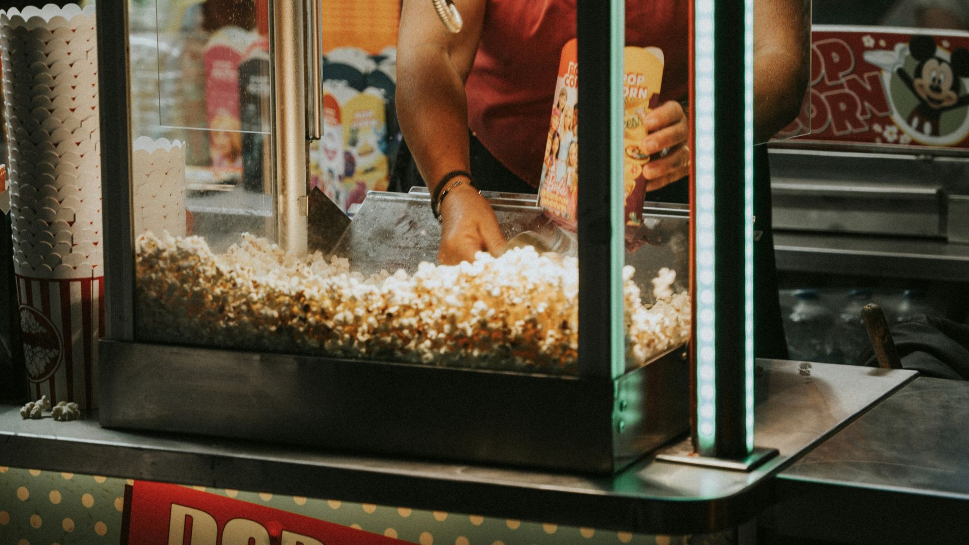a popcorn machine sitting on top of a table