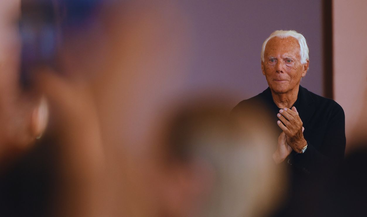   Gettyimages - 1153323126, FASHION-FRANCE-GIORGIO ARMANI Italian fashion designer Giorgio Armani acknowledges the audience at the end of his Women's Fall-Winter 2019/2020 Haute Couture collection fashion show in Paris, on July 2, 2019. 