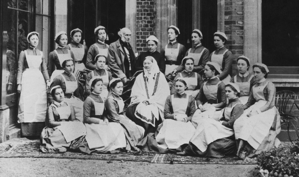 Nurse and hospital reformer Florence Nightingale (1820 - 1910) with a group of nurses from London hospitals at Claydon. Standing behind her are her brother-in-law Sir Harry Verney (owner of Claydon) and the matron Miss Crossland.