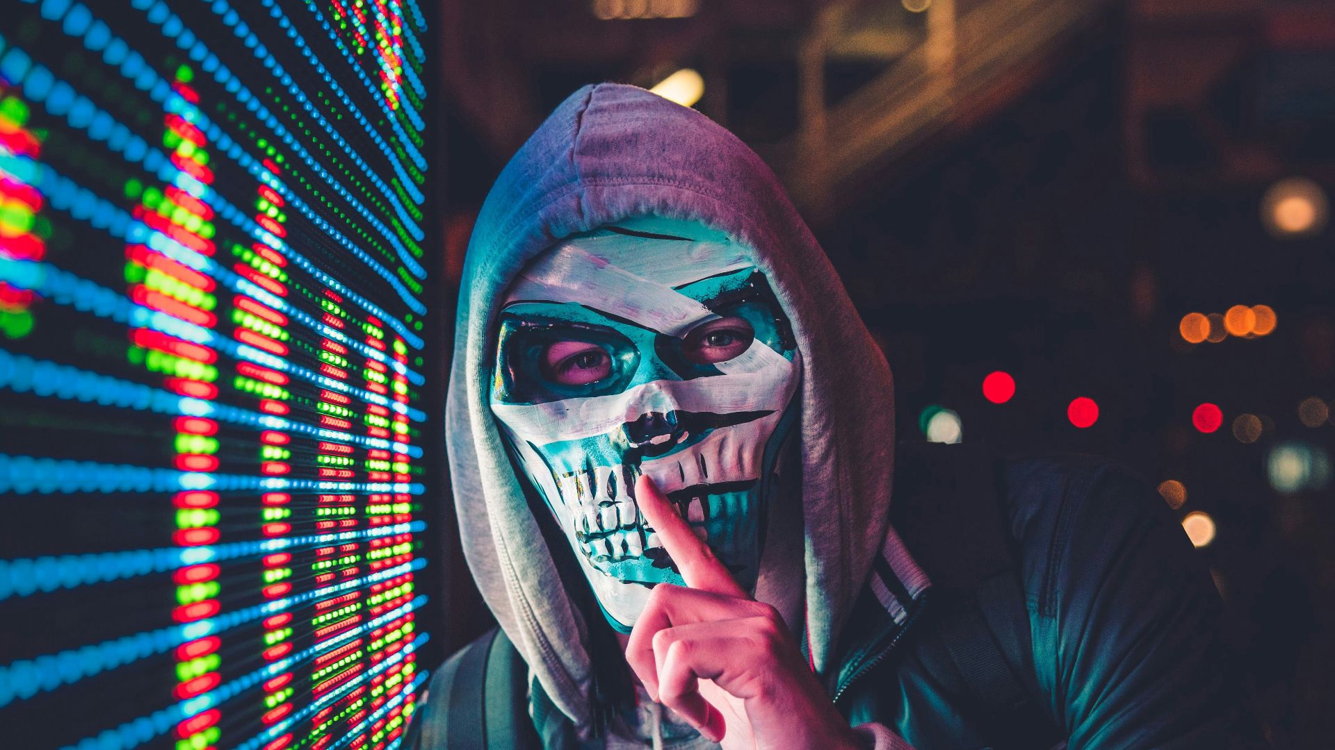 person standing near LED sign