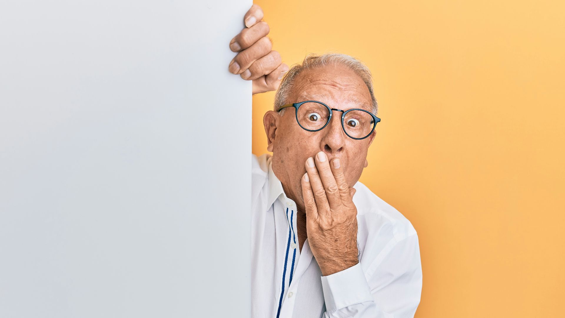 man in white dress shirt wearing black framed eyeglasses