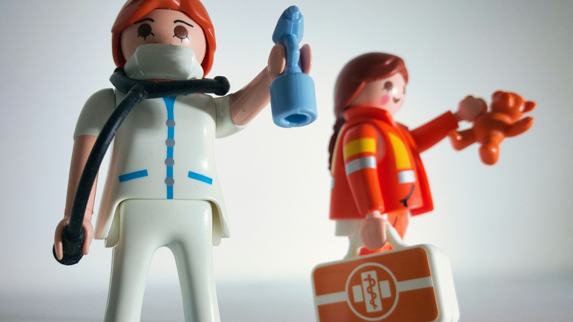 boy in blue and white suit plastic toy