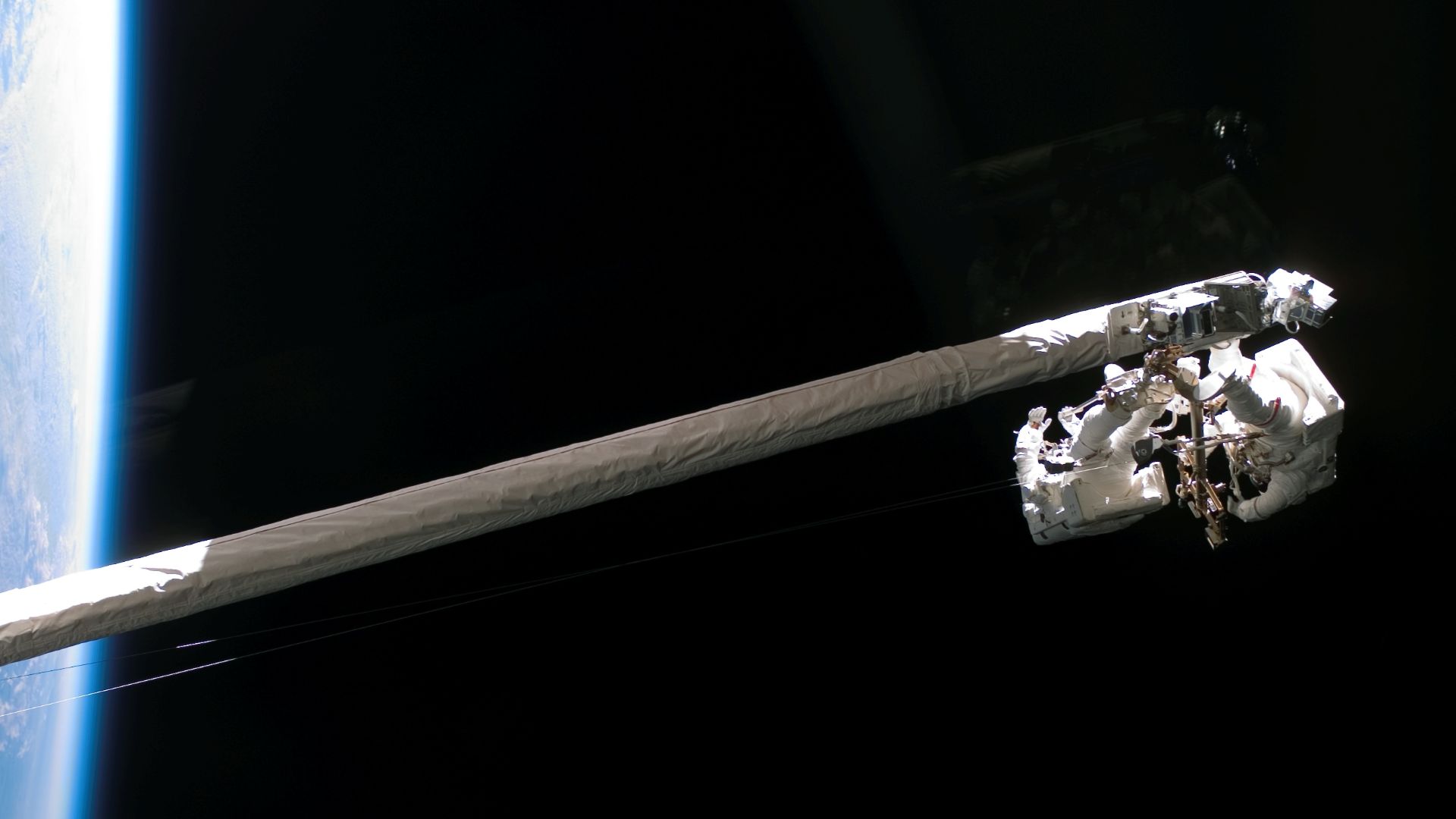 File:STS-121 Sellers Fossum RMS-OBSS.jpg