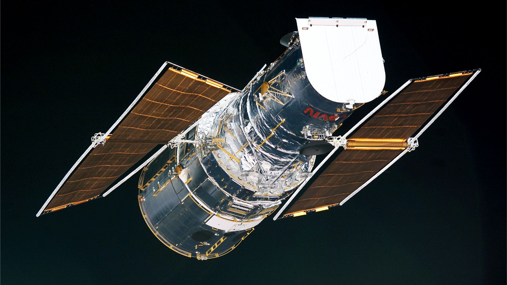 File:Hubble solar arrays after Servicing Mission 3B.jpg