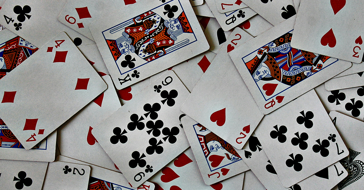 What is put on a table, cut, but never eaten?