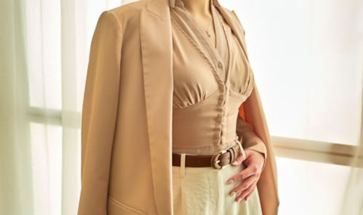 Woman in neutral outfit