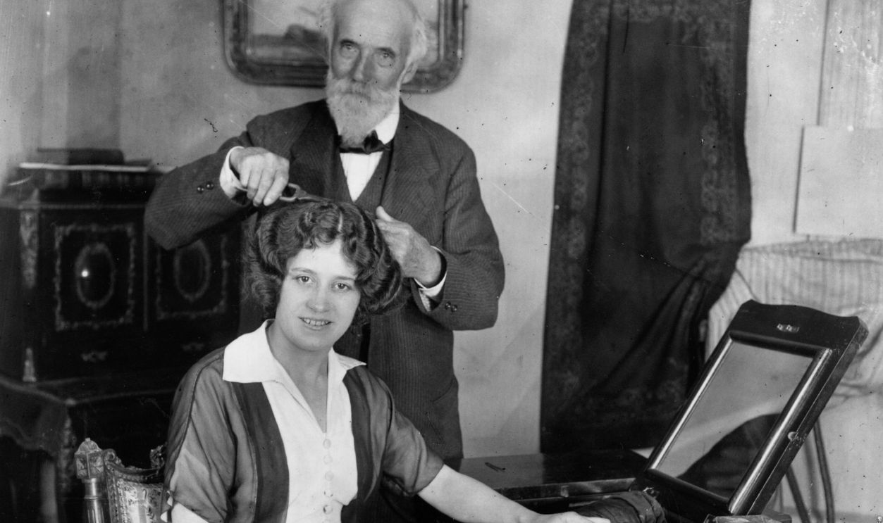 Inventor of the styling technique of hairwaving, Marcel Grateau, demonstrates how it is done. 