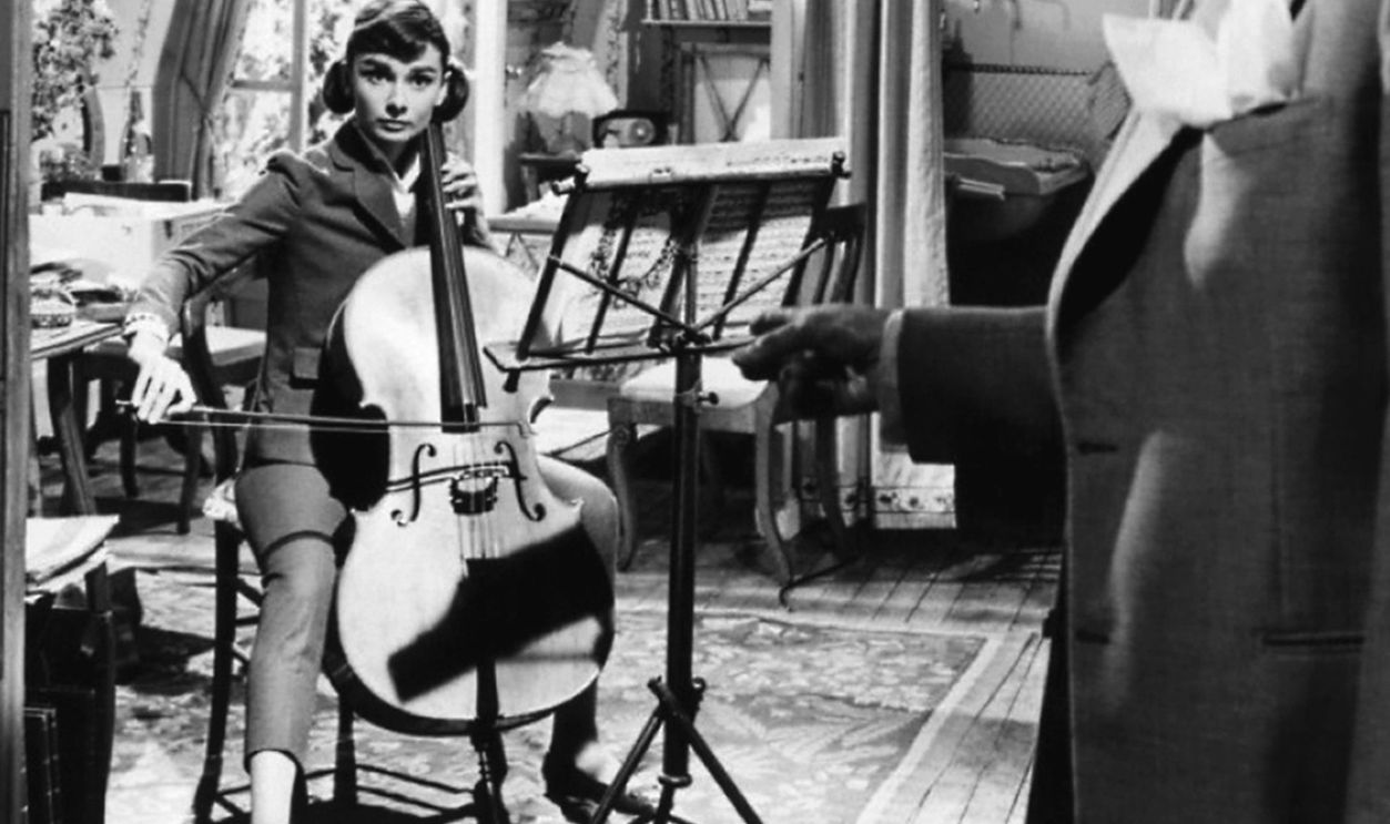 1957: Actress Audrey Hepburn and Maurice Chevalier in a a publicity still for the Allied Artists Pictures film 'Love in the Afternoon' in 1957.