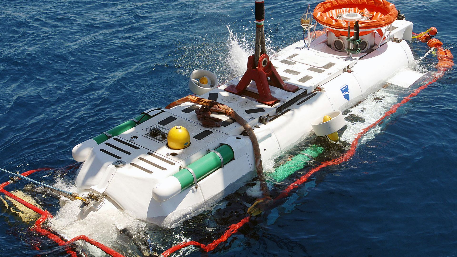File:LR5 rescue vehicle is lowered into the water.JPEG