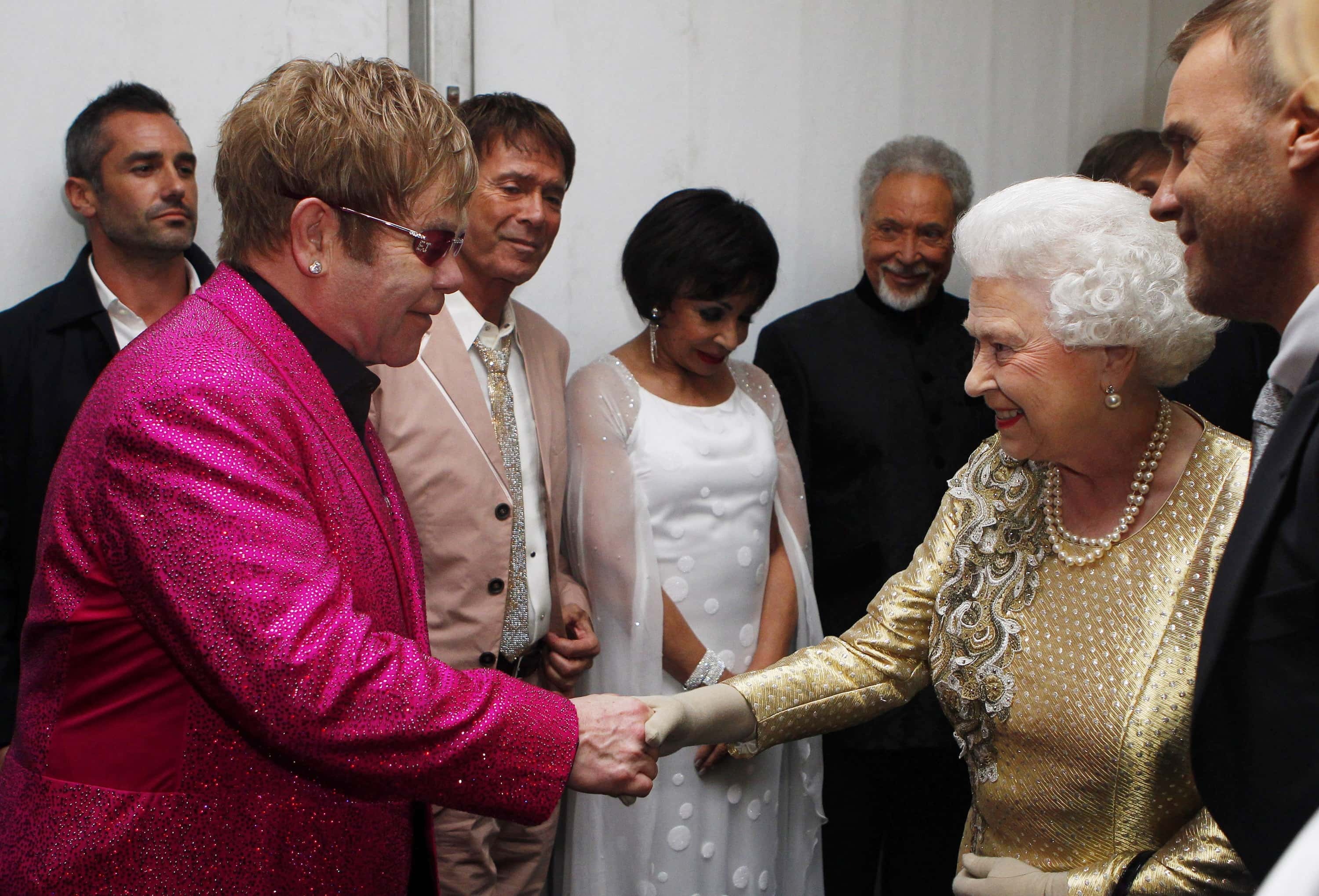 Queen Elizabeth II is introduced to Sir Elton John - 2012