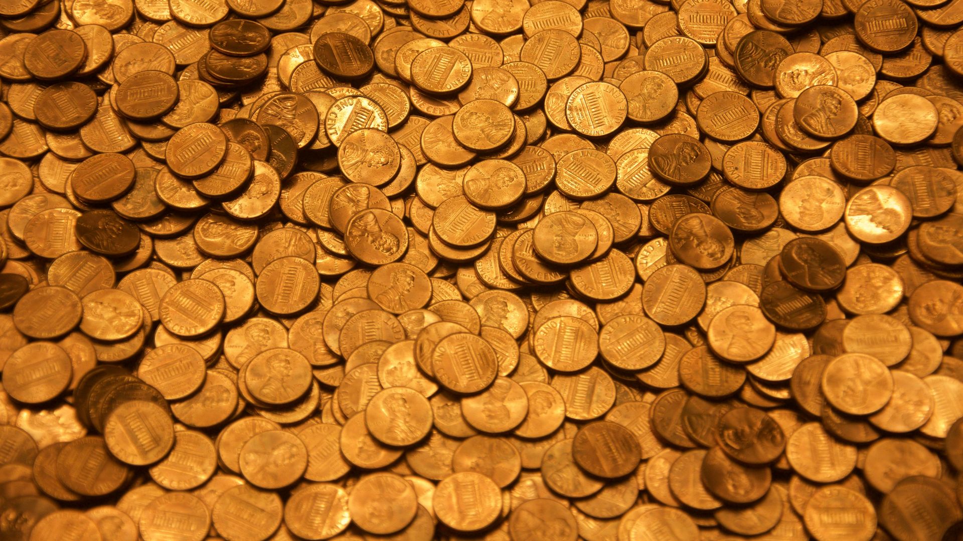 brown round coins on brown wooden surface