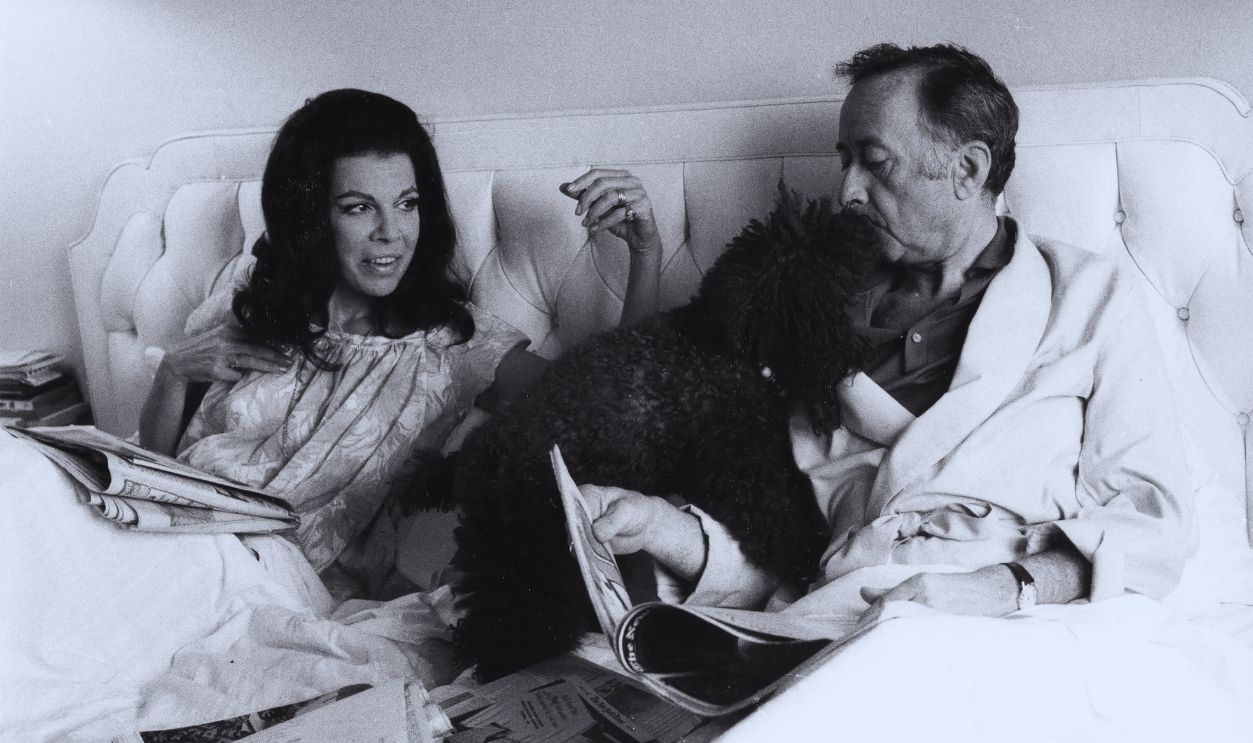  Gettyimages  - 660267197, Author Jacqueline Susann Jacqueline Susann in bed along with her poodle Josephine and her husband Irving Mansfield at the Hotel Navarro on Central Park South, New York City, New York, May 11, 1969. 