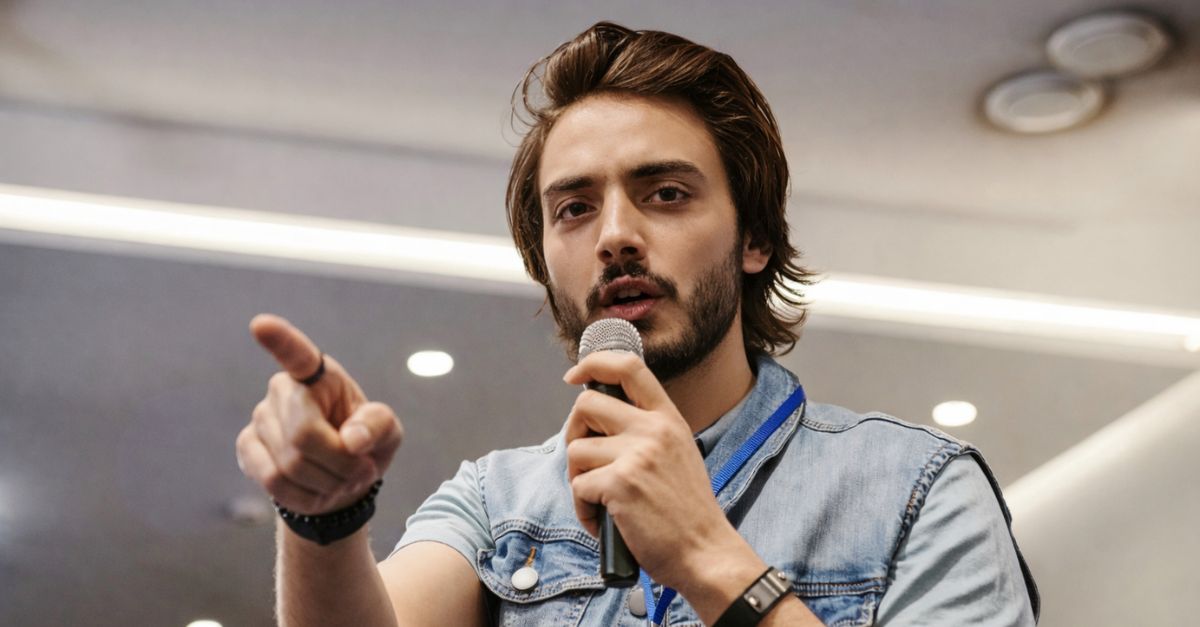Young man talking with a microphone