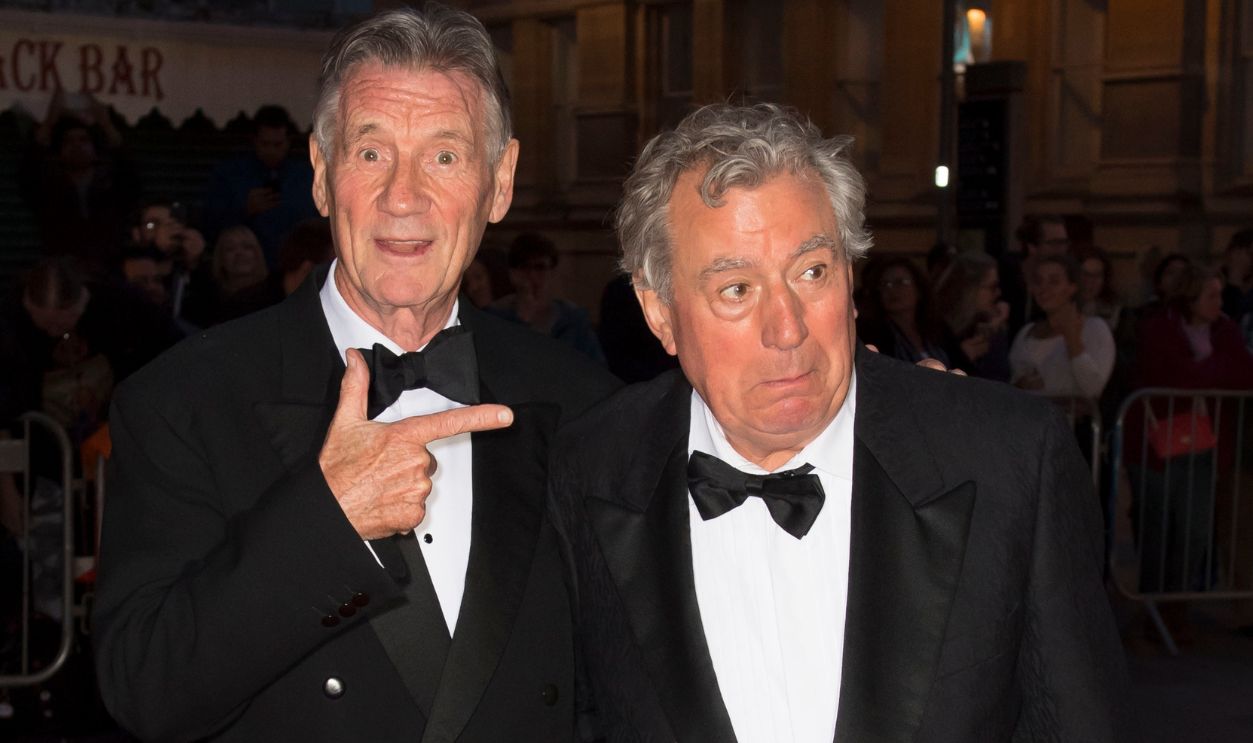 Michael Palin (L) and Terry Jones arrive for the 25th British Academy Cymru Awards at St David's Hall on October 2, 2016 in Cardiff, Wales. 