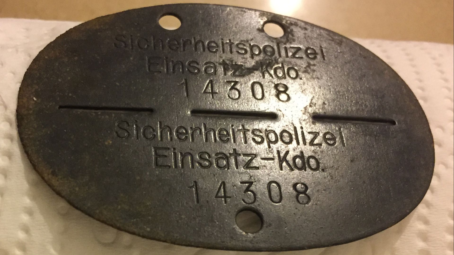 File:Einsatzgruppen SD issued and used dog-tag.jpg