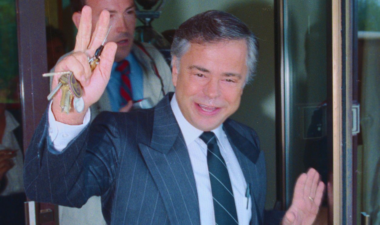 Gettyimages - 517819396, Jim Bakker Leaving Outreach Center (Original Caption) Ft. Mill, S.C.: PTL founder Jim Bakker smiles as he leaves the World Outreach Center at Heritage USA following a meeting with PTL trustee M.C. 