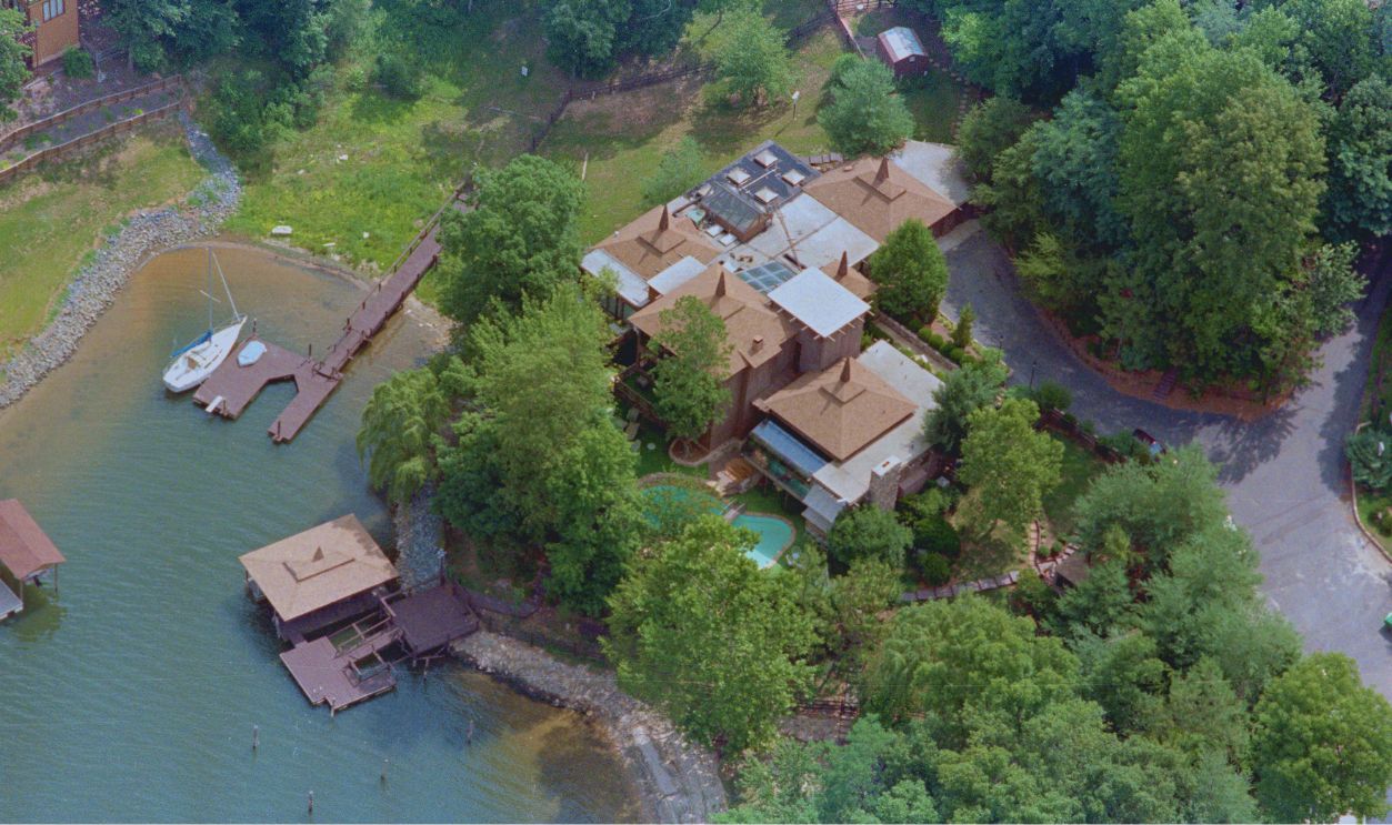 Gettyimages - 517790940, Home of Jim and Tammy Faye Bakker (Original Caption) Tega Cay, S.C.: The controversial million dollar PTL personage, currently occupied by Jim and Tammy Bakker, is shown here in a June 20 aerial photograph. 