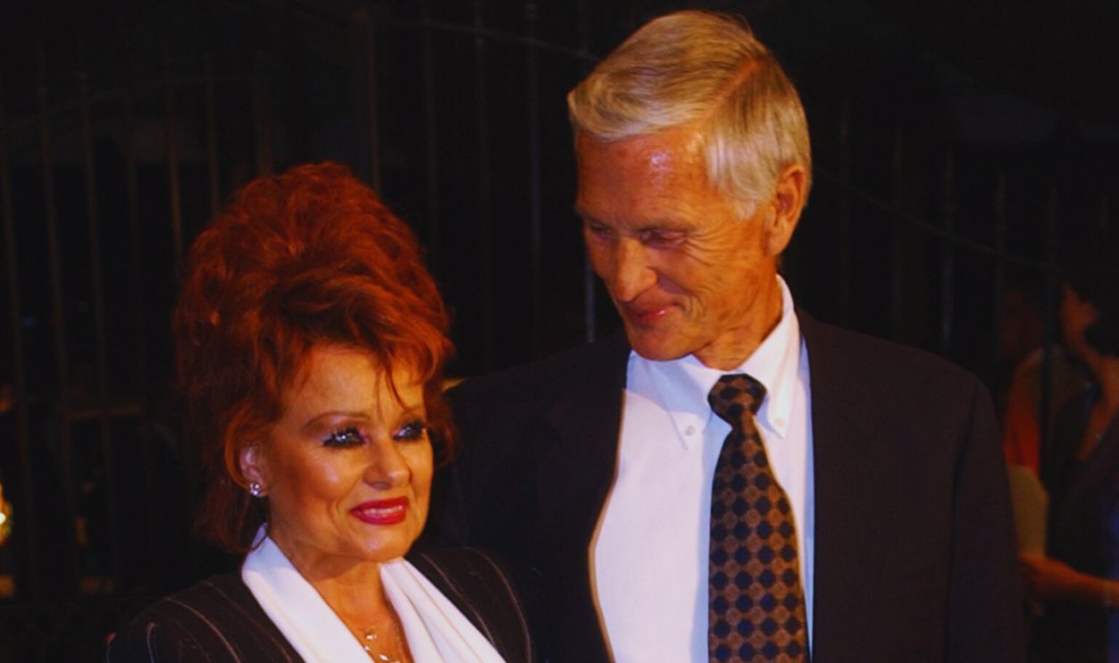 Gettyimages - 1969609, Pre-Kentucky Derby Barnstable-Brown Party LOUISVILLE, KY - MAY 2: (Hollywood Reporter Out) Tammy Fay and her guest Roe Messner arrive at the pre-Kentucky Derby Barnstable-Brown party May 2, 2003 in Louisville, Kentucky.  