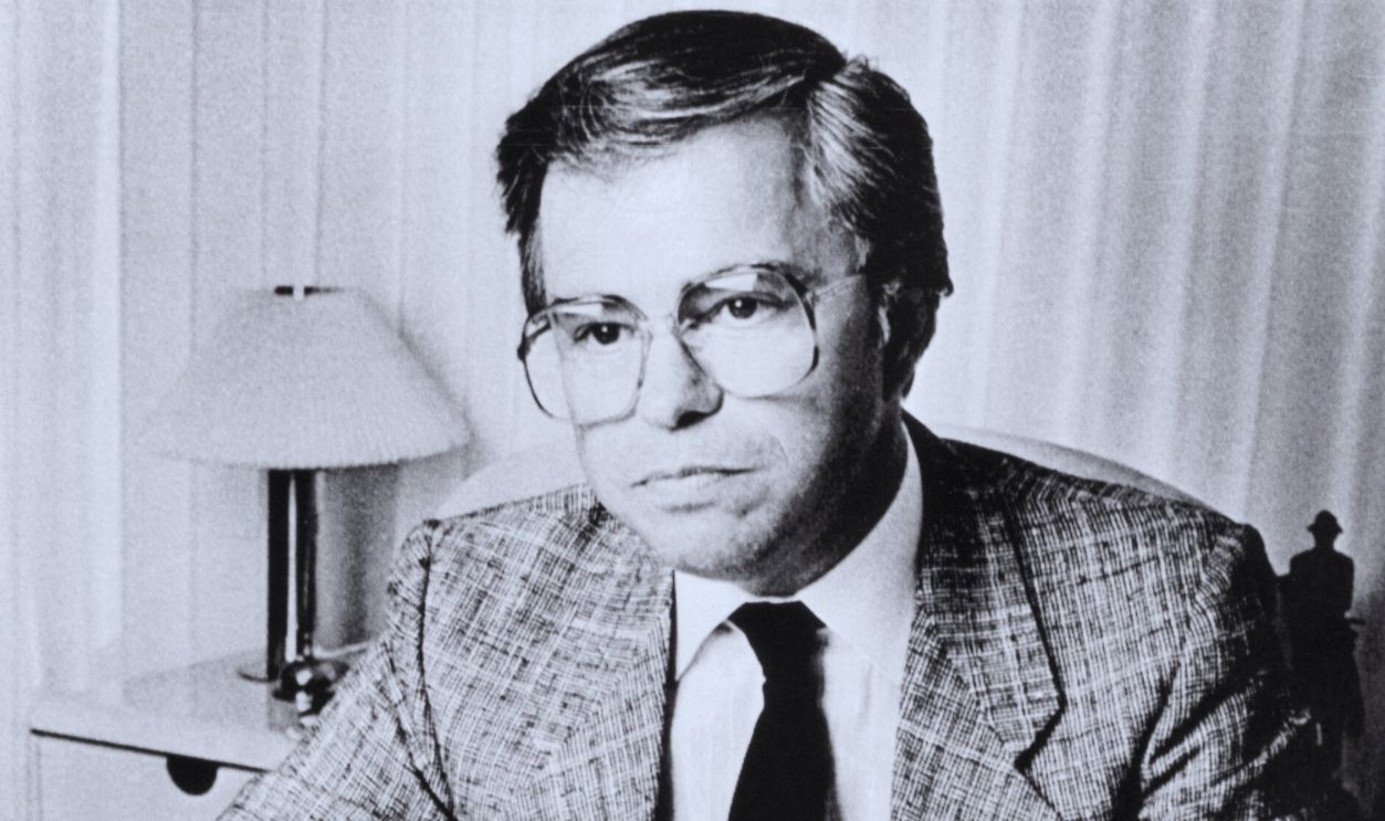 Gettyimages  - 517292710, Televangelist Bakker Confronting Headlines Televangelist Jim Bakker holds newspaper articles about his marital and financial improprieties in his South Carolina office. 