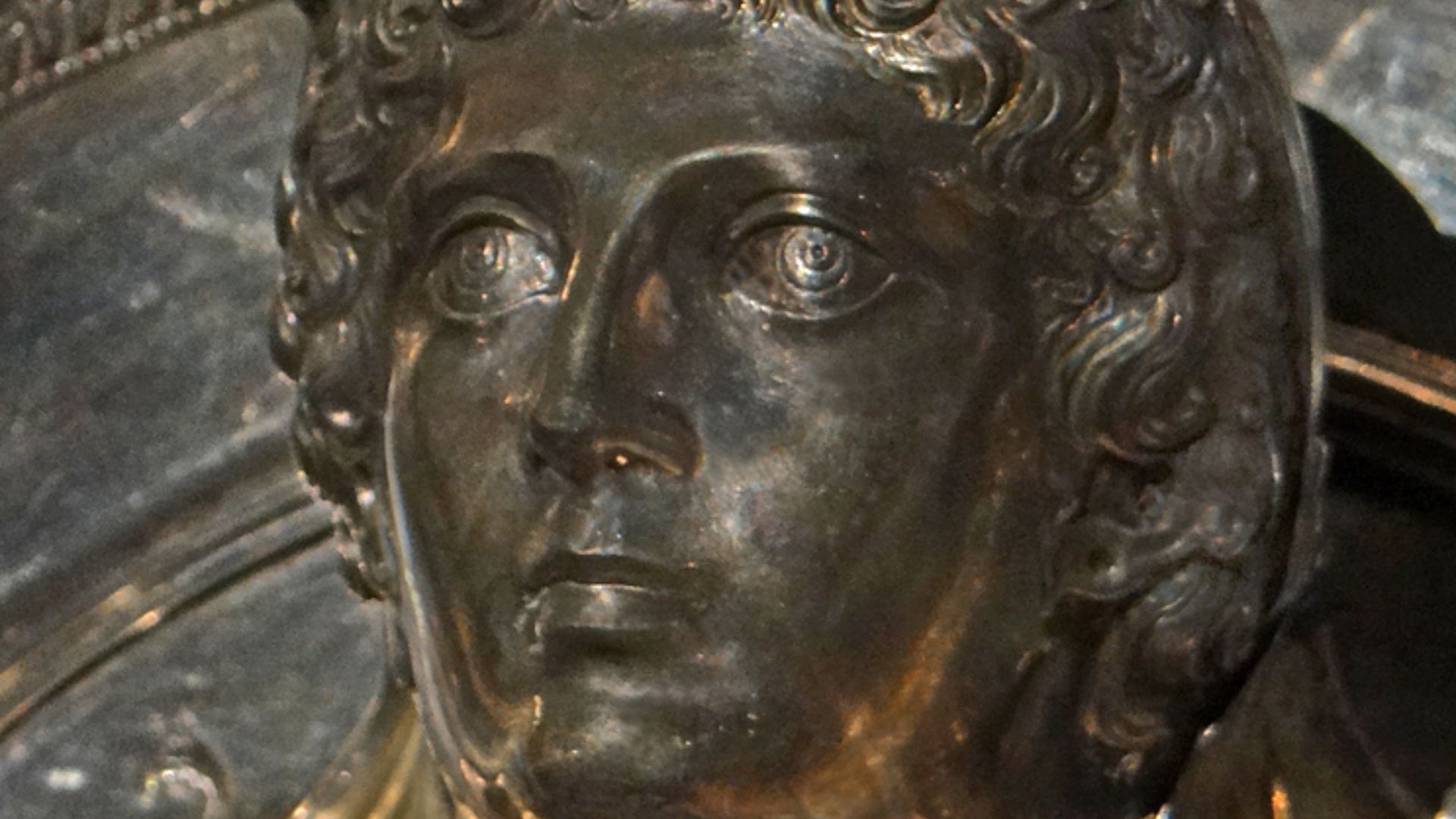 A raised relief depiction of a woman with an elephant skin cap on a gilded dish from the Boscoreale Treasures of the Villa Boscoreale, Italy, dated to the early 1st century AD and thought to depict Cleopatra Selene II, Queen of Mauretania, wife of Juba II