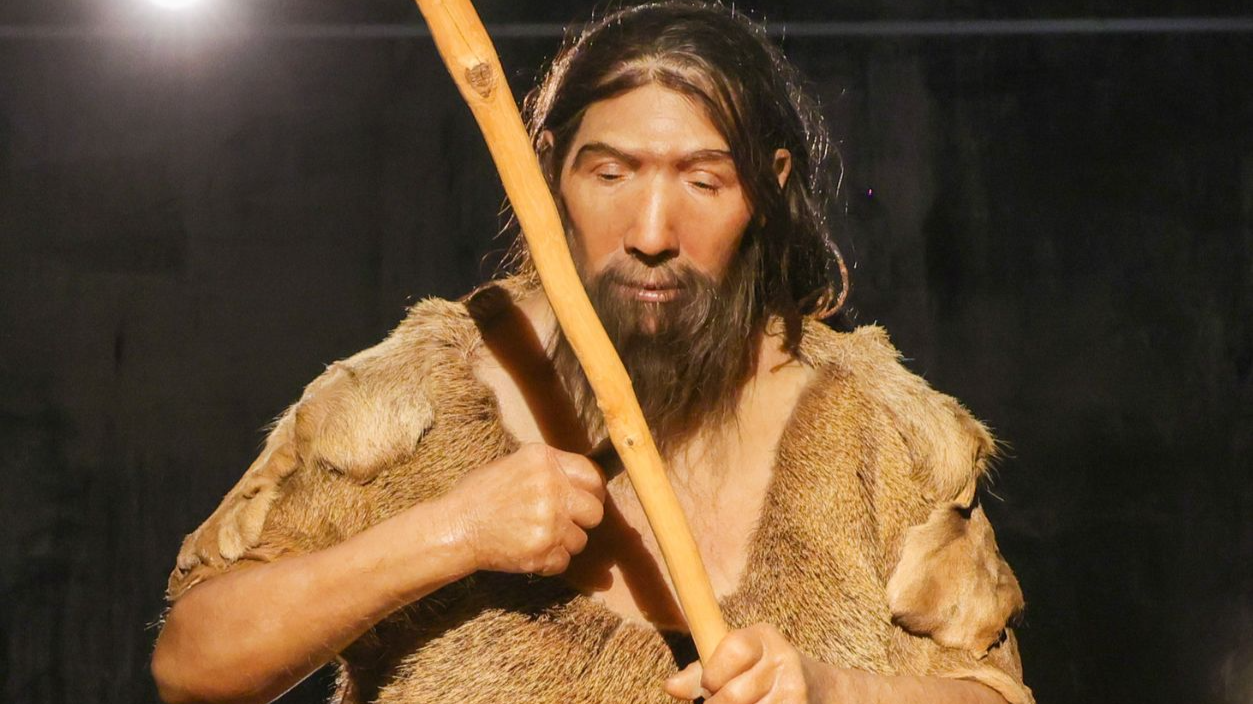 Getty Images - 2271173511 - The figure of a Neanderthal stands in the exhibition  Survival in the Ice Age.