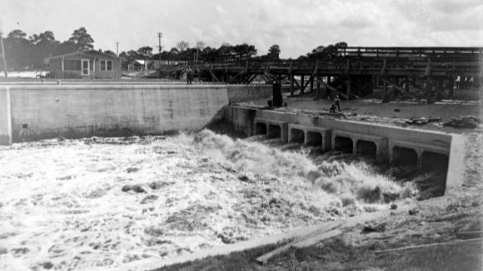 View of canal lock in the Everglades Drainage District circa 1915 (	The Everglades Drainage District was established in 1913 (Ch. 6456, 1913 Laws) for the purpose of draining and reclaiming lands located near the Everglades for agricultural and sanitary p