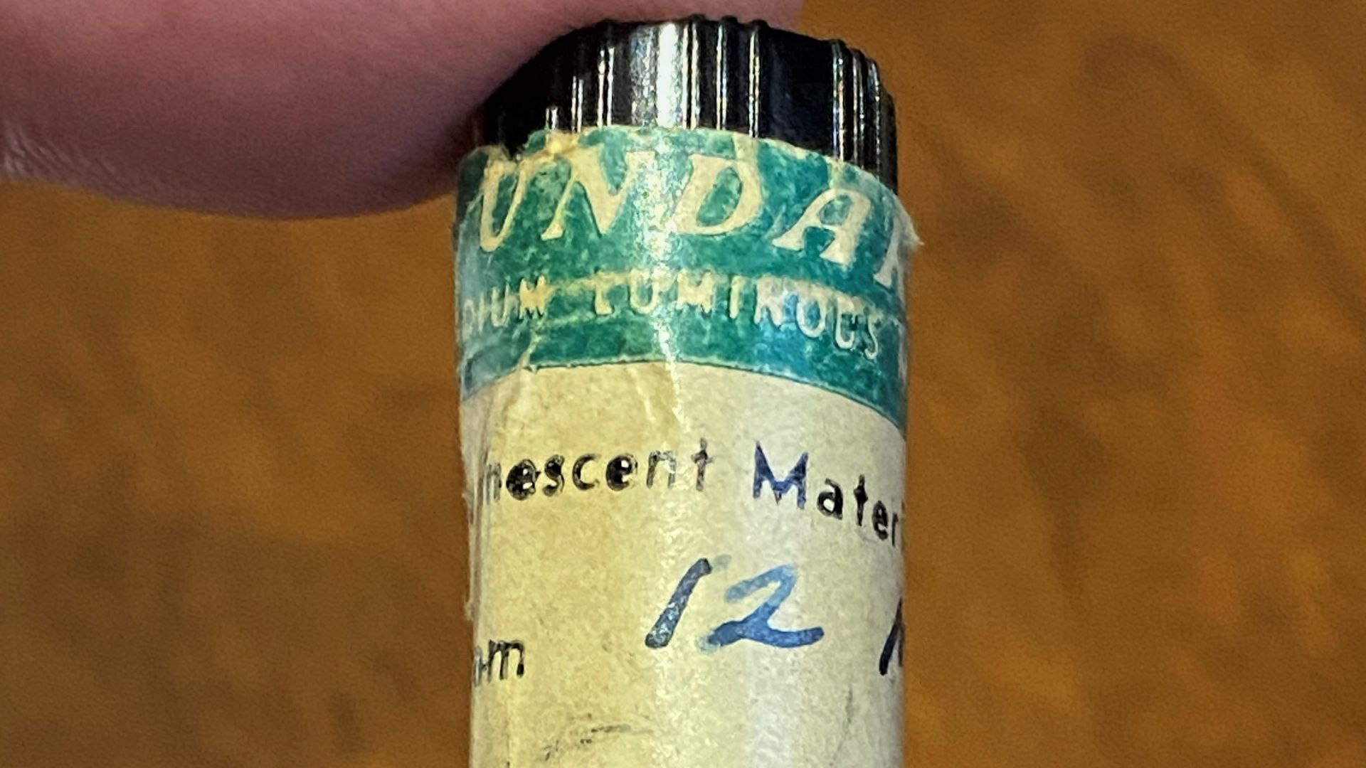 Radium-based (radioactive) luminescent material for painting watch dials manufactured by the United States Radium Corporation.