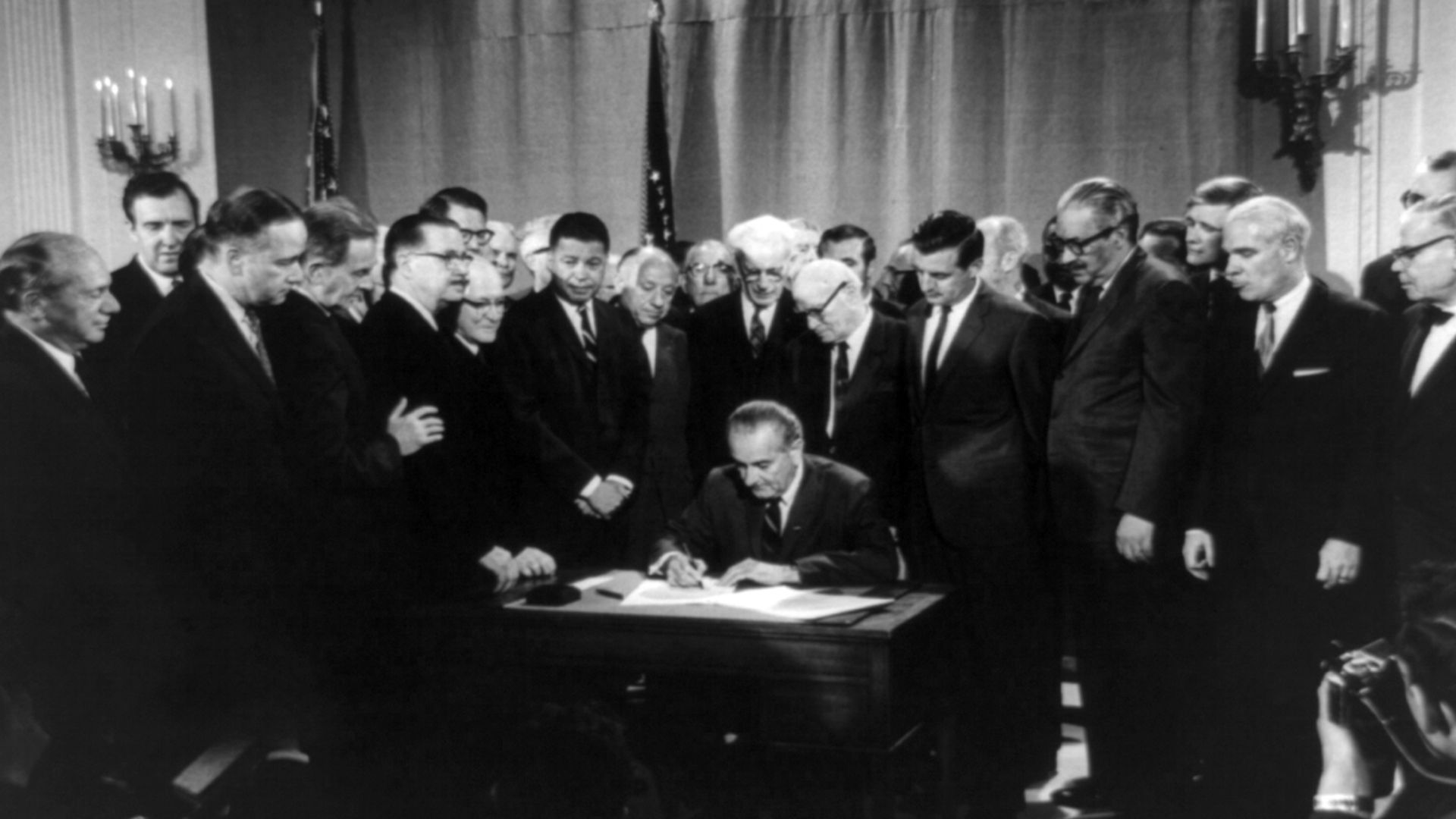 President Lyndon B. Johnson signing the Civil Rights Act of 1968