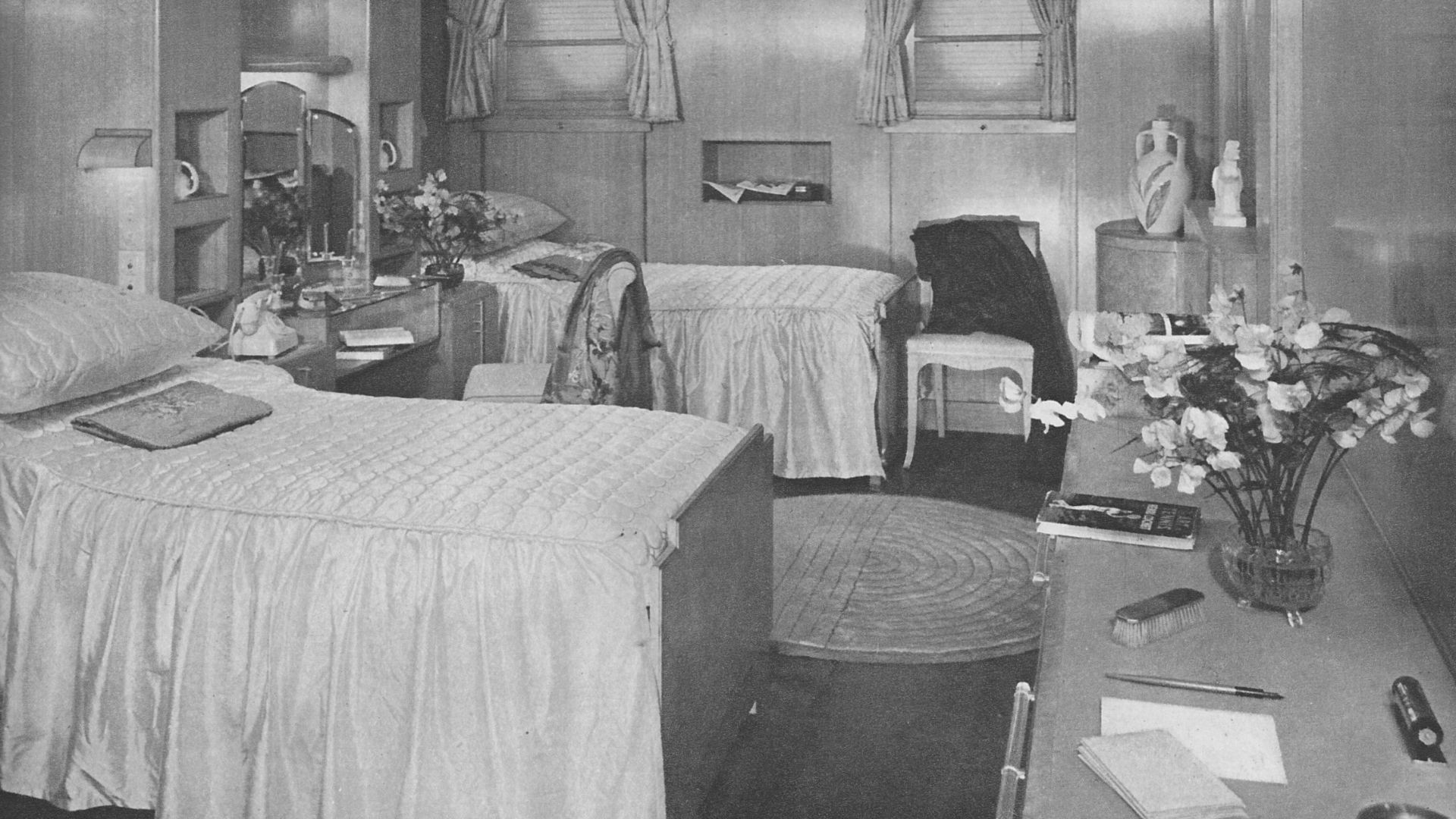 First class bedroom of the RMS Queen Mary photographed in 1936