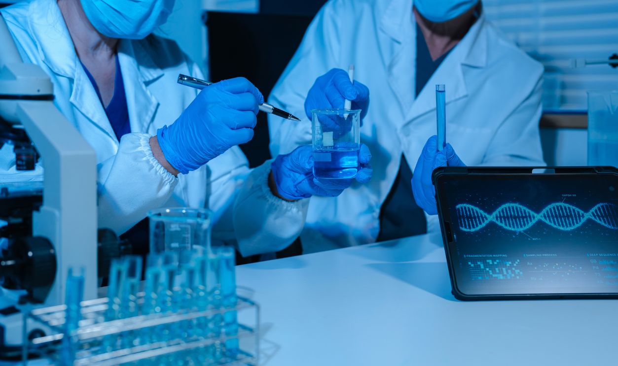 Life scientists researching in laboratory. Healthcare and biotechnology concept.