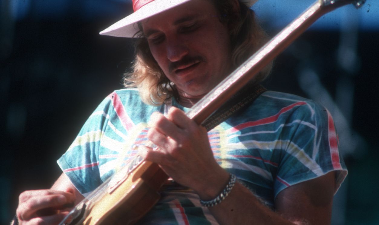 Joe Walsh of the rock band "Eagles" performing onstage in 1980. 