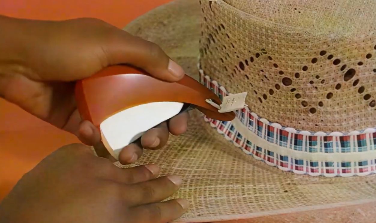Screenshot from Ronco Buttoneer ad