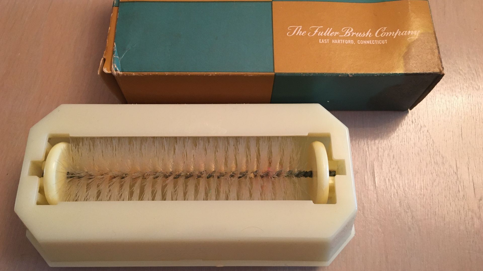 Underside of, and box for, the Table Tidy Crumb Sweeper as sold by The Fuller Brush Company of East Hartford, Connecticut.  Made in U.S.A.  From the 1950s or 1960s.