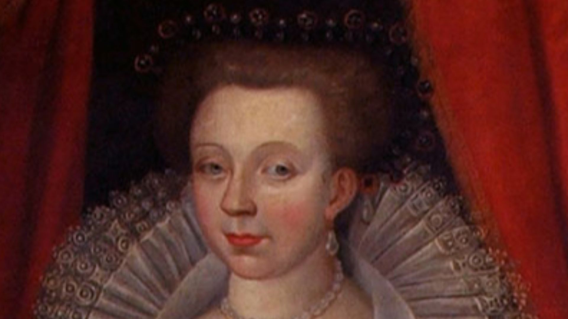 Portrait of Catherine of Cleves (1548-1633). Catherine, possibly with child, wears a framing headdress and a fashionable dress with a wide neckline ruff, crescent neckline, and slashed sleeves with jewels at both ends and the center of the slash. Her ruff