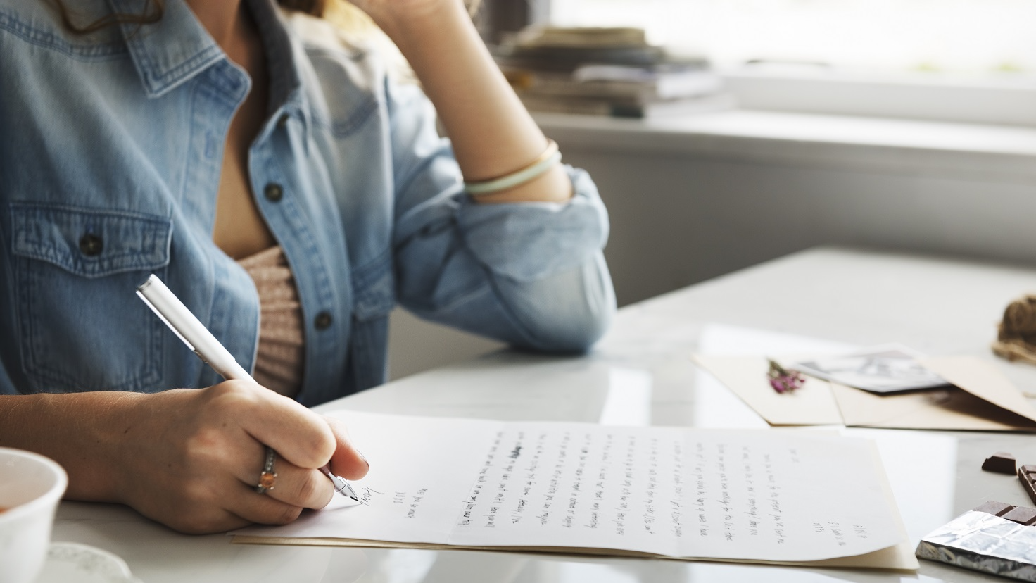 Girl Writing Letter Home Concept