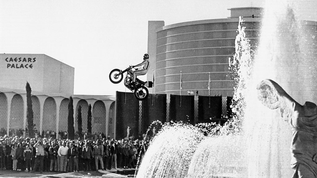 Motorcycle stunt man Evel Knievel jumping over the fountain at Caesars Palace