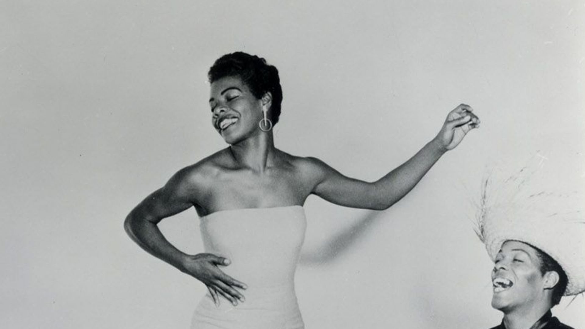 Press photo of Maya Angelou (standing, center) for the 1957 film Calypso Heat Wave