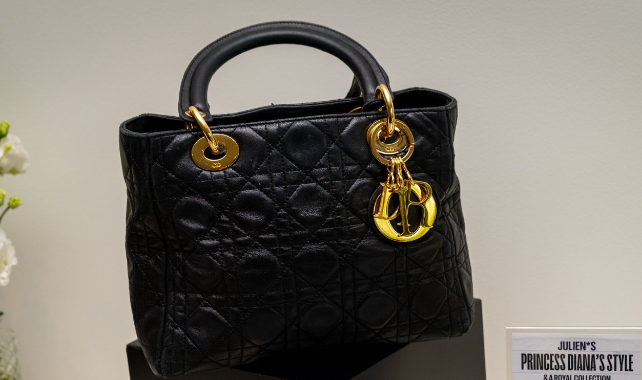 A Princess Diana Lady Dior Lambskin Handbag estimated between $20,000 - $30,000 on display at the preview of Princess Diana's Style & A Royal Collection, the largest collection of Diana, Princess of Wales' fashion to appear at auction. Over 200 items of Princess Diana's wardrobe feature alongside pieces owned by the Duke and Duchess of Windsor, Queen Elizabeth II and the Queen Mother in the private exhibition at the Peninsula London, before heading to the Peninsula Beverly Hills where the items will be sold by Julien's Auctions on June 26. Picture date: Tuesday June 3, 2025.