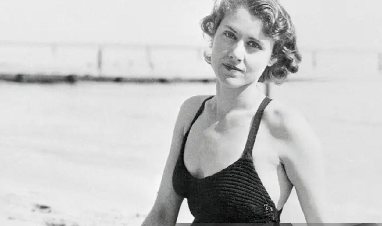 (Original Caption) Relaxing at Miami Beach in 1935, Clare Boothe poses p