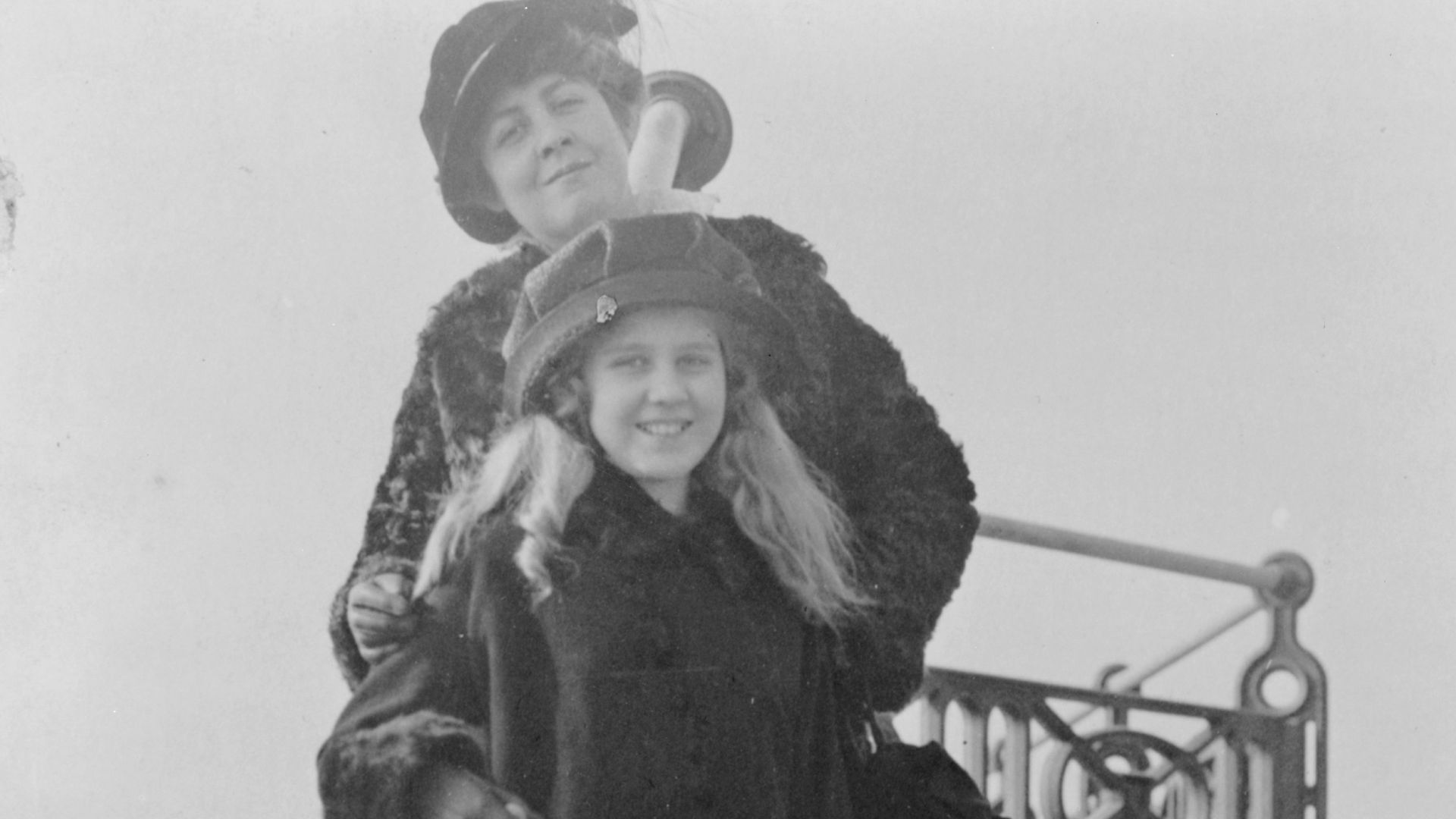 Title: Clare Boothe Luce and her mother, standing on steps, outdoors, enroute to Europe
Abstract/medium: 1 photographic print.
