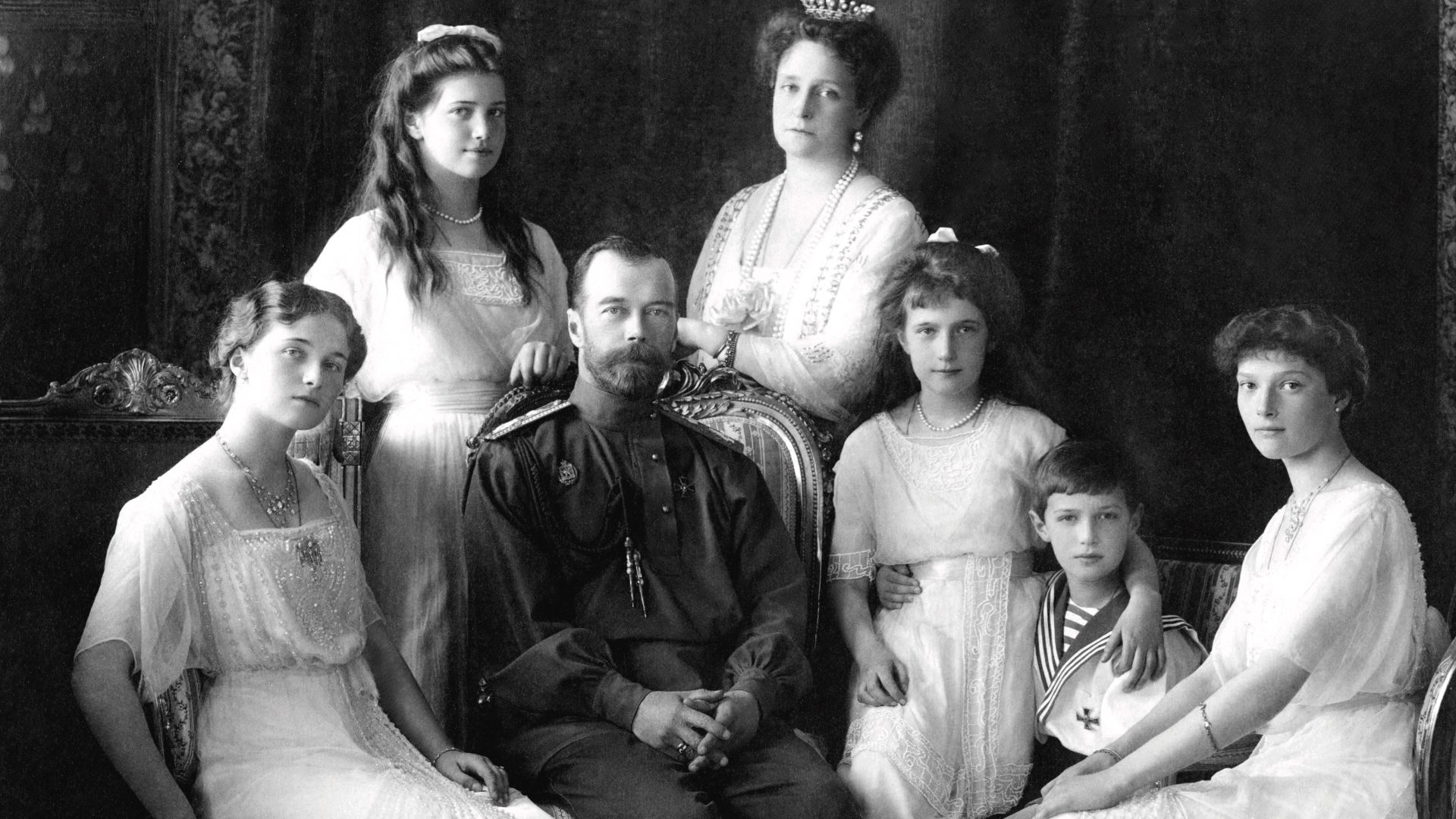 Nicholas II of Russia with the family (left to right): Olga, Maria, Nicholas II, Alexandra Fyodorovna, Anastasia, Alexei, and Tatiana. Livadiya, Crimea, 1913. Portrait by the Levitsky Studio, Livadiya. Today the original photograph is held at the Hermitag
