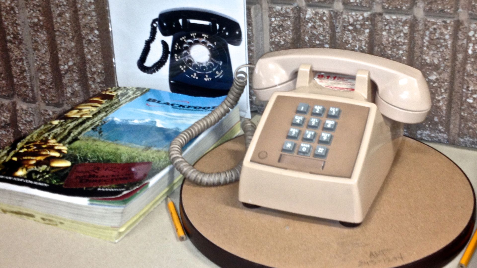 Courtesy phone, telephone book, and pencils - Missoula Public Library. The entire state of Montana is area code 406.