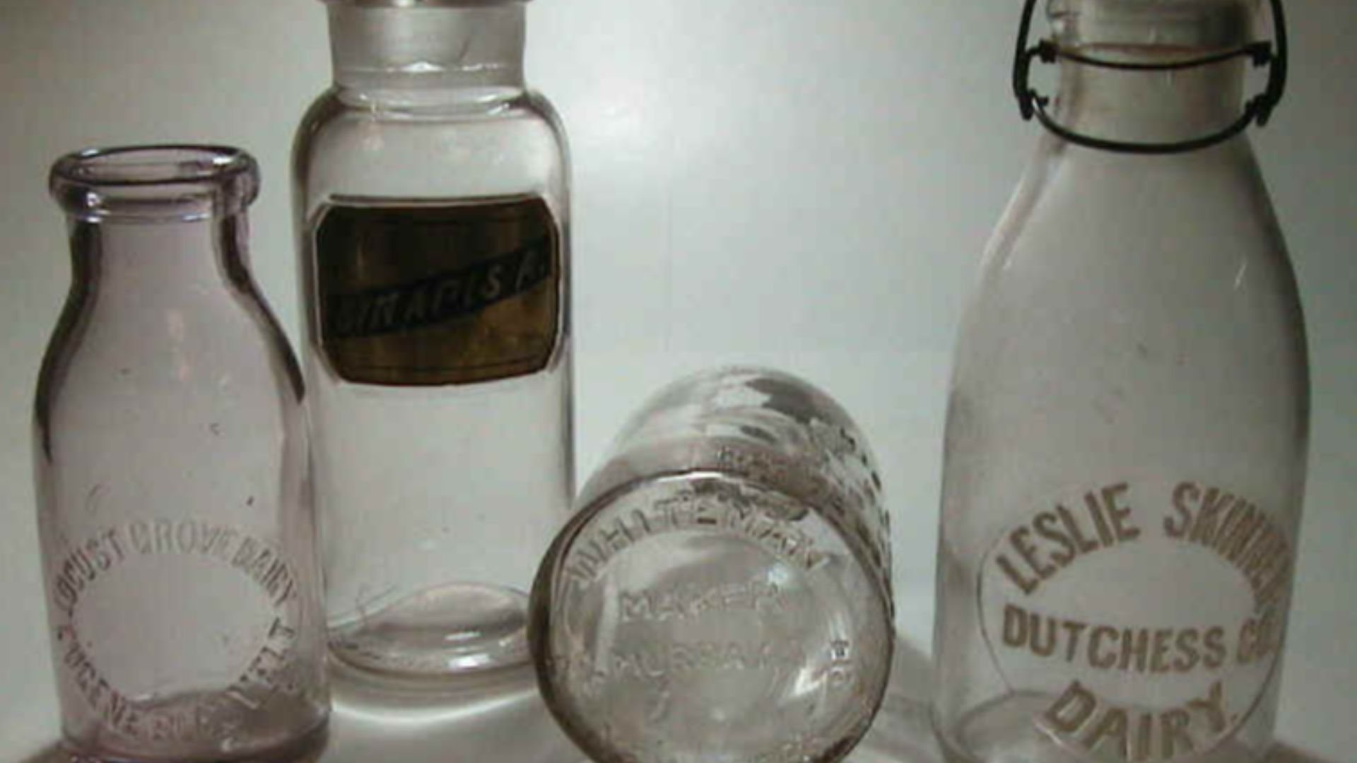 Examples of Milk bottles made in the Late 19th and early 20th Century.  They were made at the Warren Glass Works Company. The milk bottles are embossed on the base with the Whiteman name and either one of two New York city addresses.  The apothecary bottl